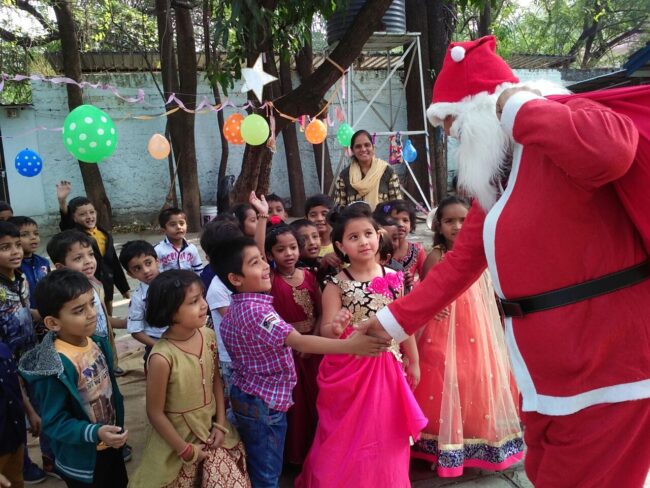 Santa spreads some cheer at the Christmas party